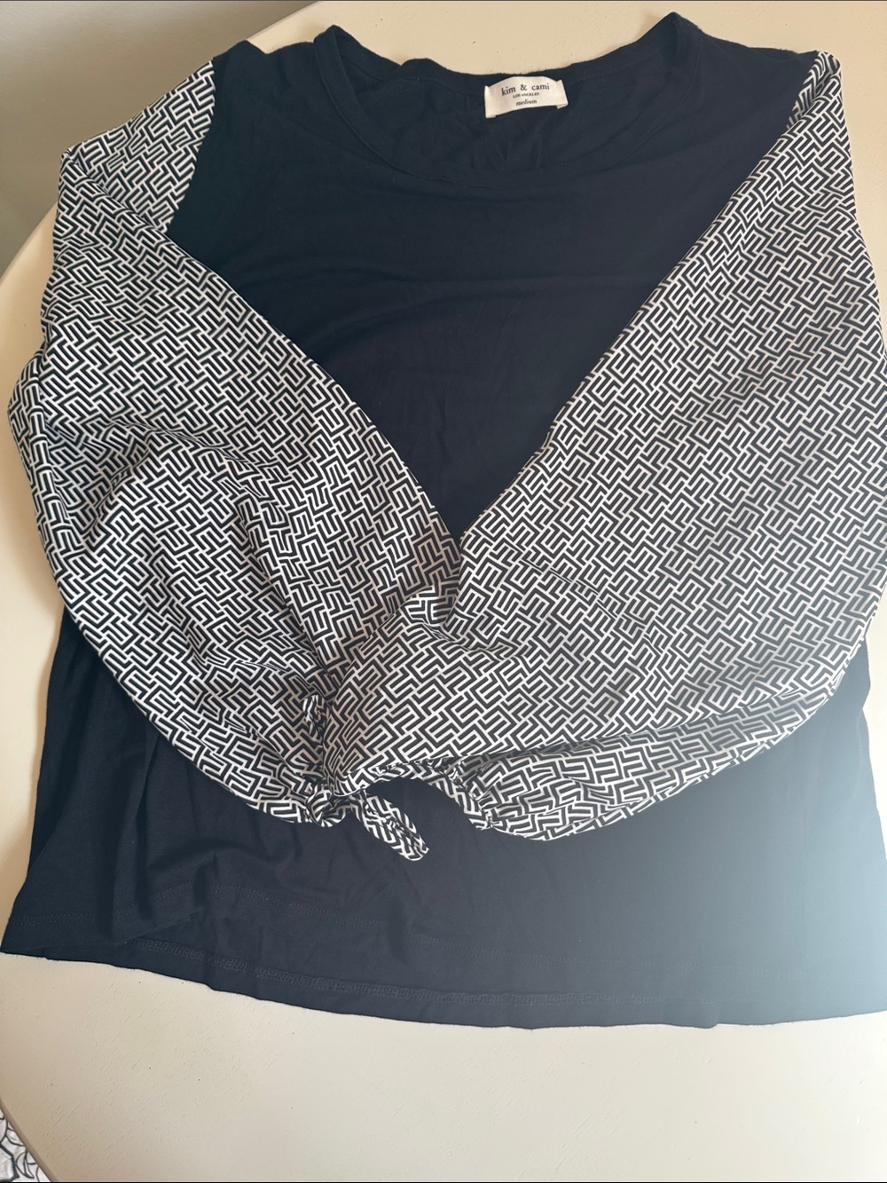 Kim & Cami Black Top with Geometric Black-and-White Balloon Sleeves